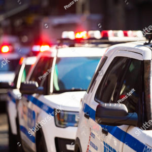 stock-photo-new-york-nypd-police-car-with-sirens-at-day-on-street-1375359047